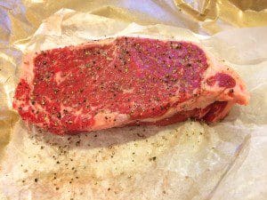 An easy recipe for black pepper steak plated on foil.