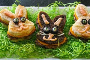 Three adorable bunny sandwiches on a plate, perfect for Easter.
