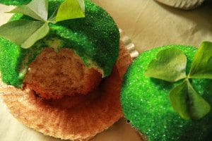 St. Patrick's Day cupcakes topped with green leaves, made using a Guiness cupcake recipe.