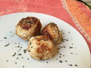 three Turkey meatballs on a plate