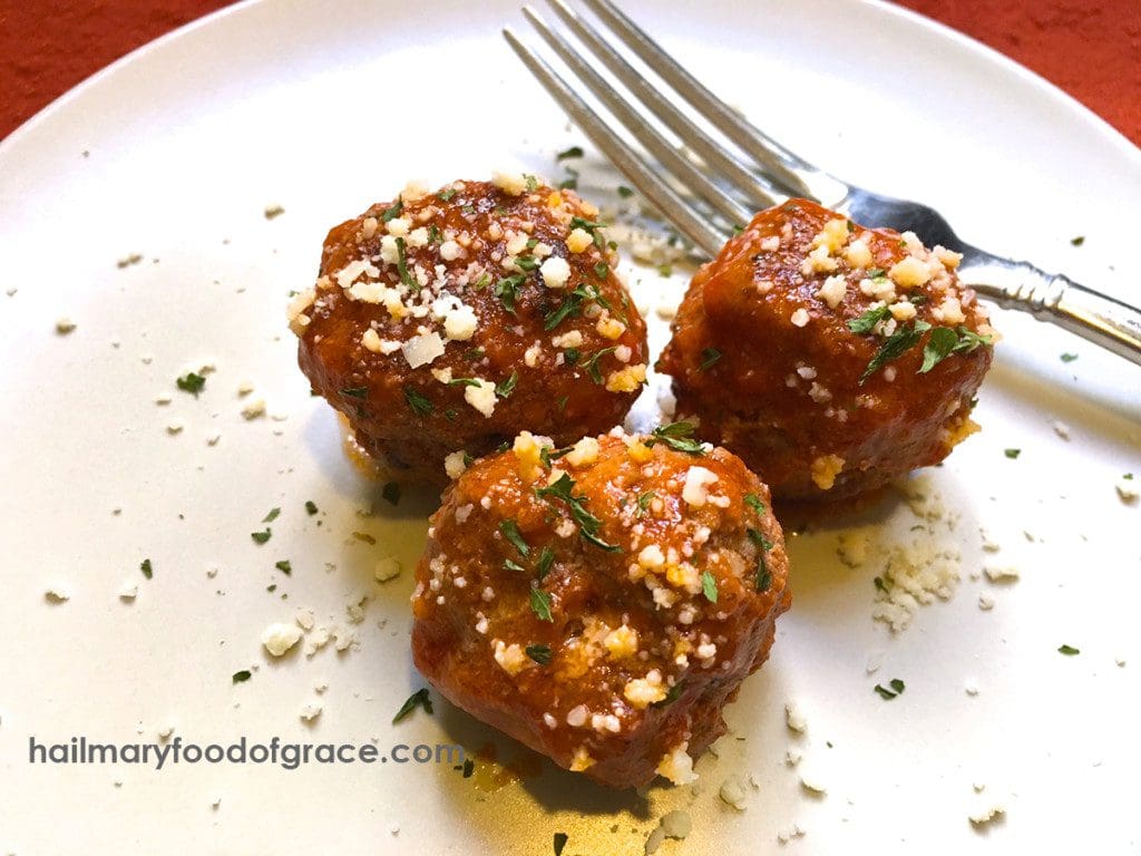 three Traditional Meatballs on plate with a fork