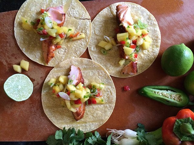 three Salmon tacos with mango salsa