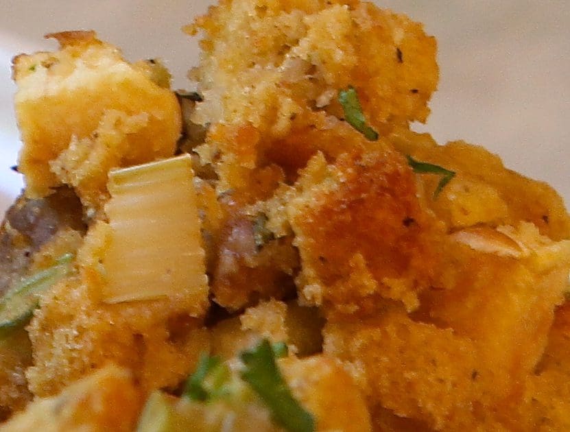 A close up of stuffing on a plate.