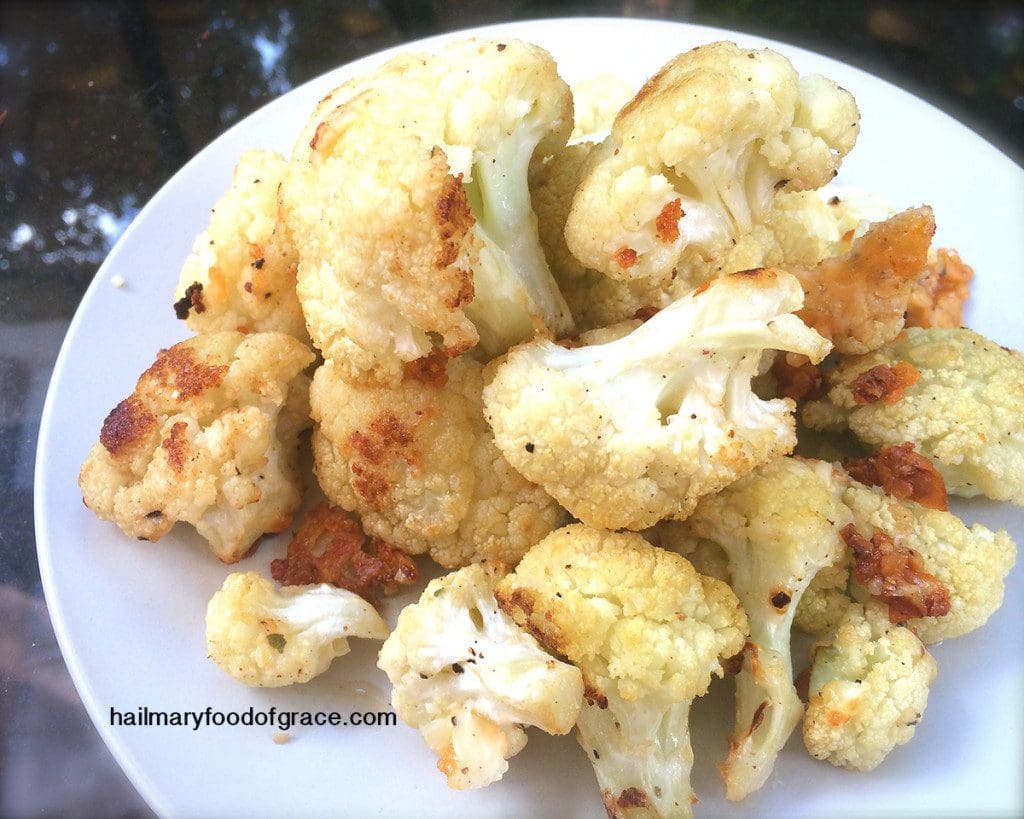 Roasted cauliflower on a white plate.