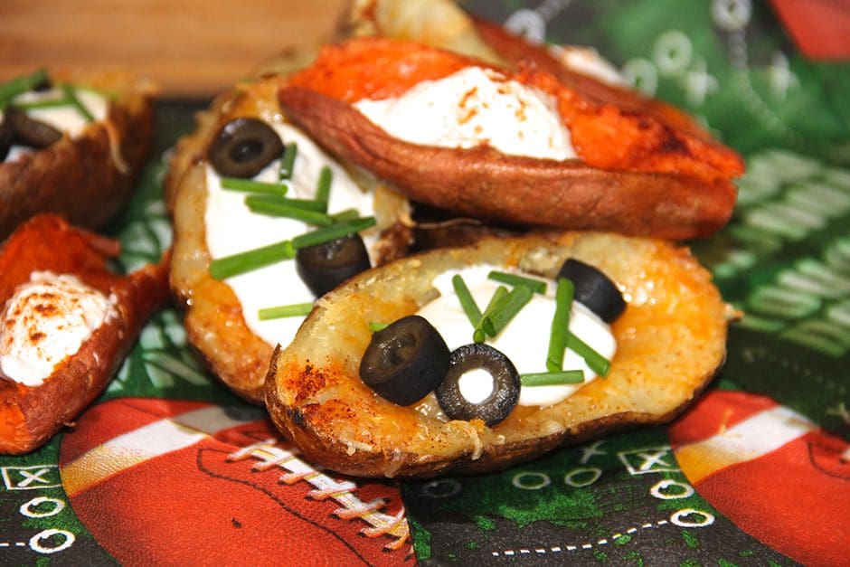 Stuffed sweet potatoes with sour cream and olives.
