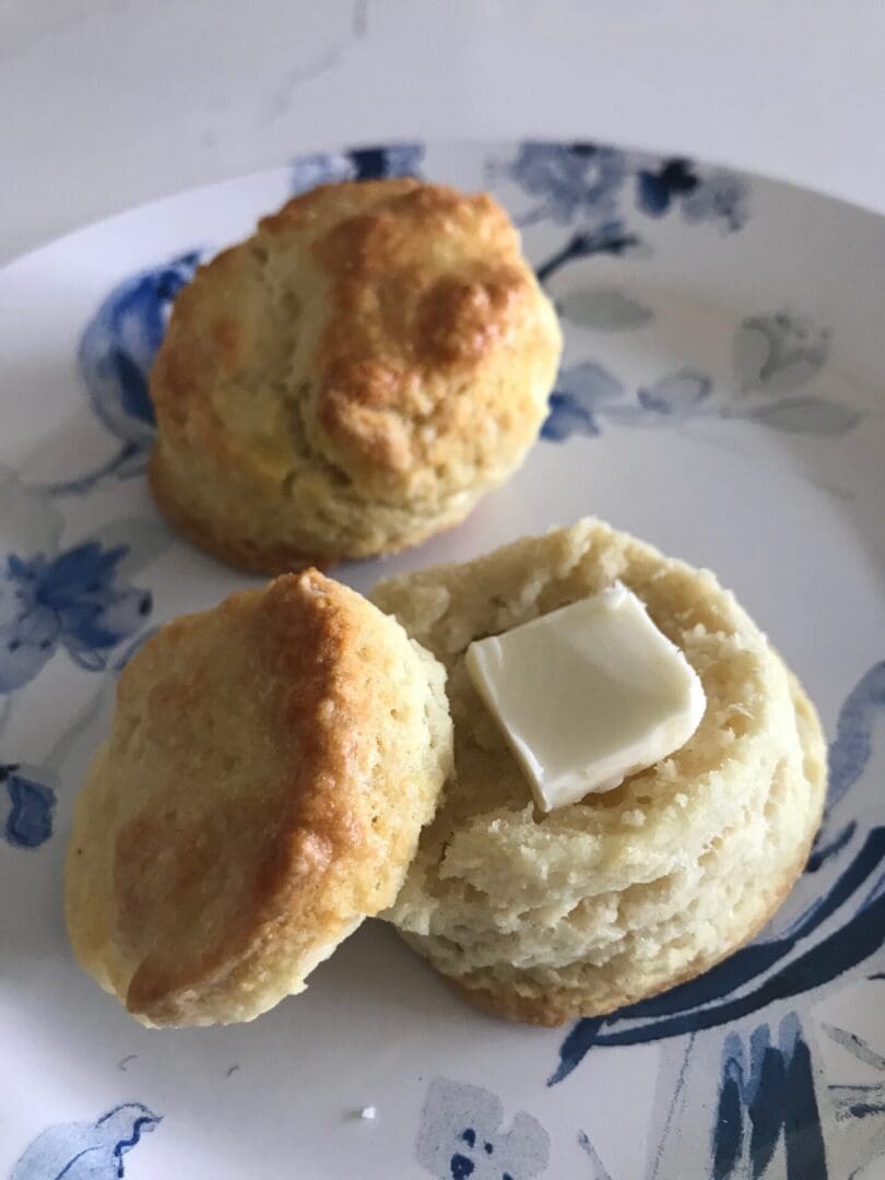 biscuits with butter on a plate