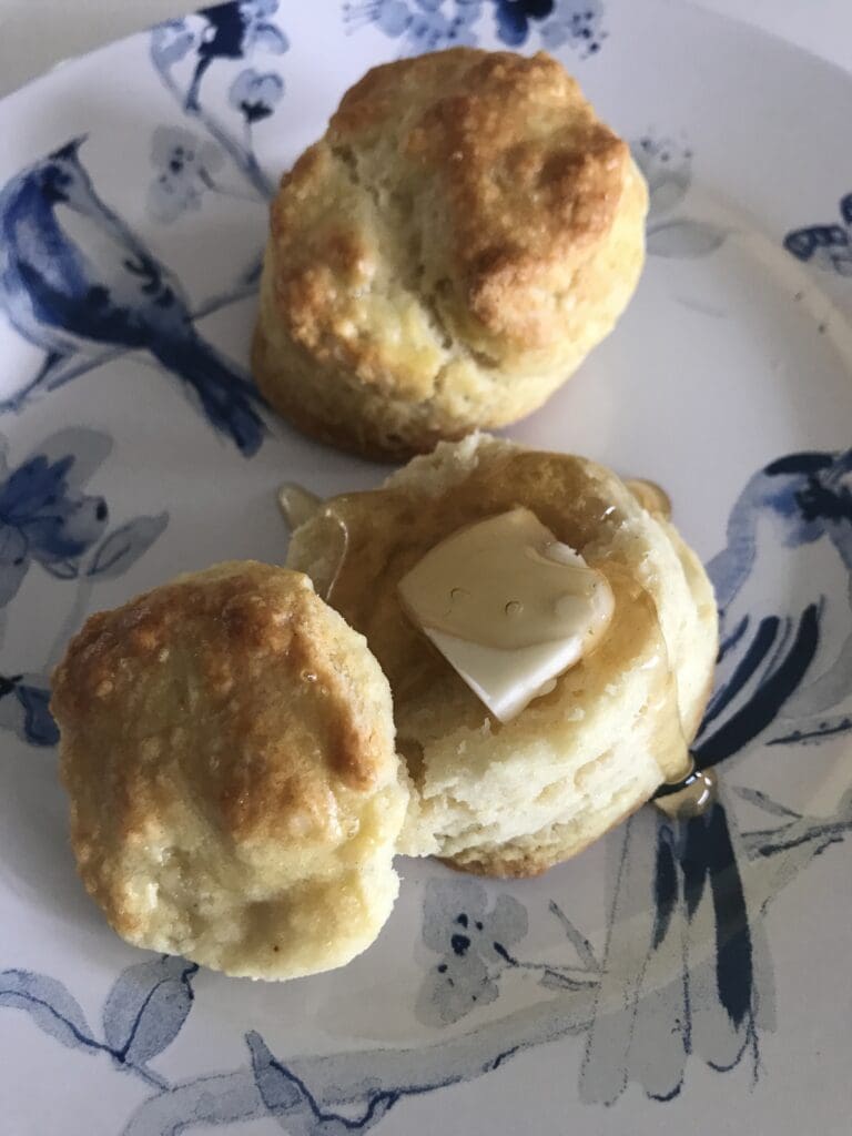 Home cooked butter biscuits with maple syrup
