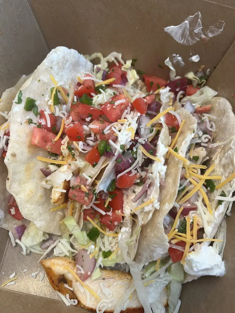 A box of tacos in a cardboard box.