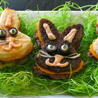 Three adorable bunny sandwiches on a plate, perfect for Easter.