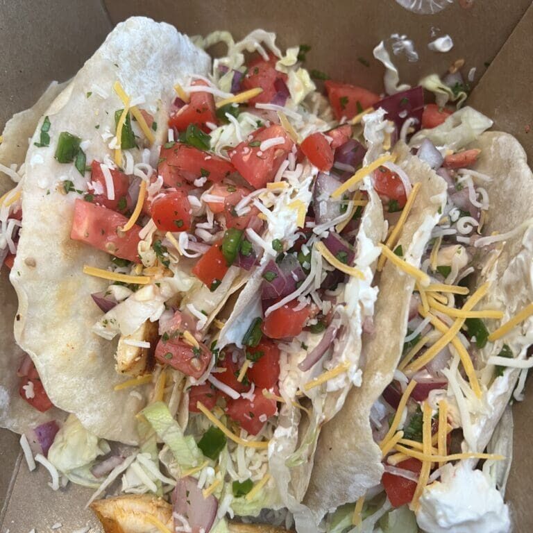 A box of tacos in a cardboard box.
