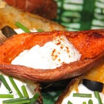 Stuffed sweet potatoes with sour cream and green olives.