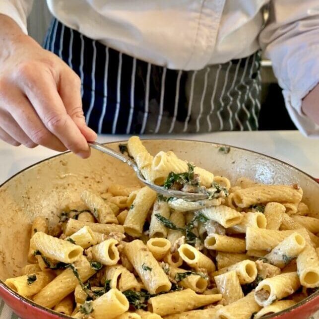 Creamy pasta with spinach and sausage.