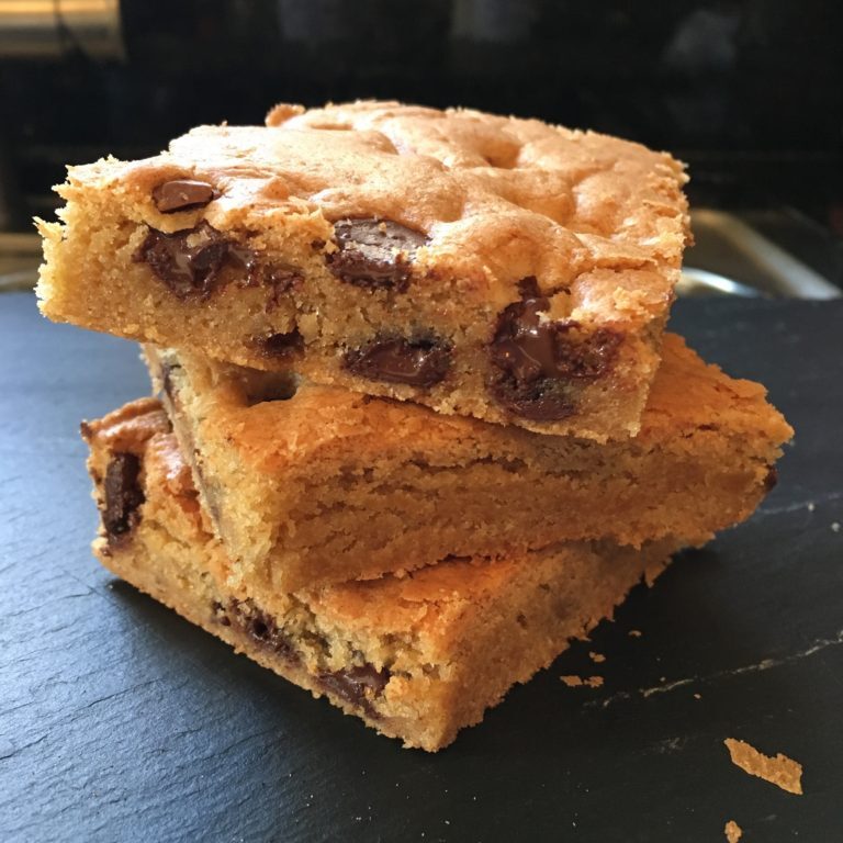 a stack of three brownies