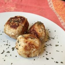 three Turkey meatballs on a plate