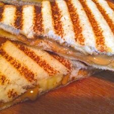 A delicious grilled sandwich topped with peanut butter - perfect for kids and easy to make.