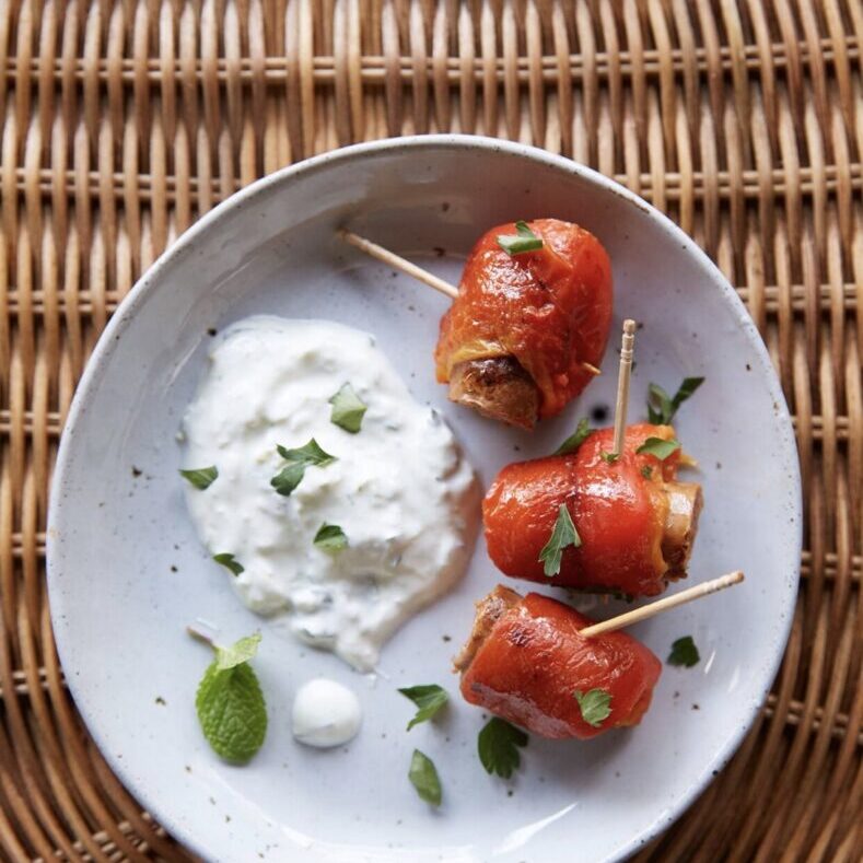 Seared lamb sausage and red pepper skewer