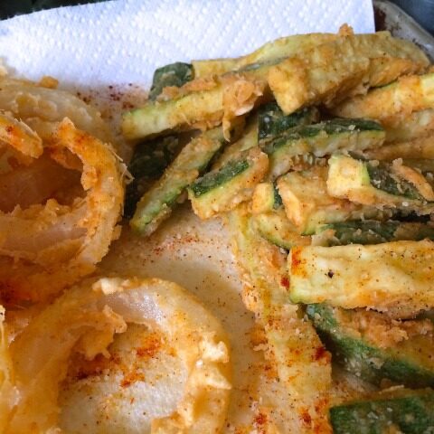 Fried zucchini and onion rings.